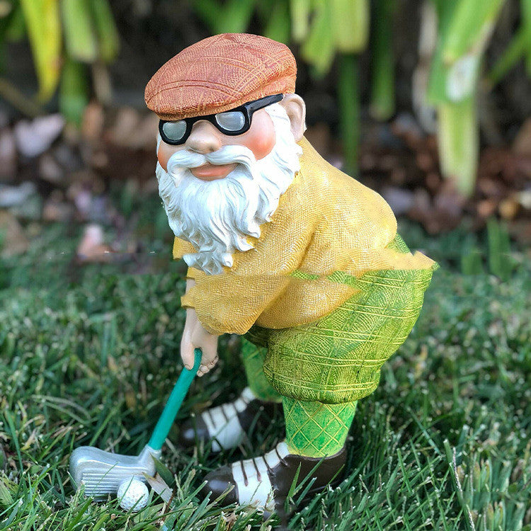 The Garden Is Decorated With Statues Of Golfing Gnomes