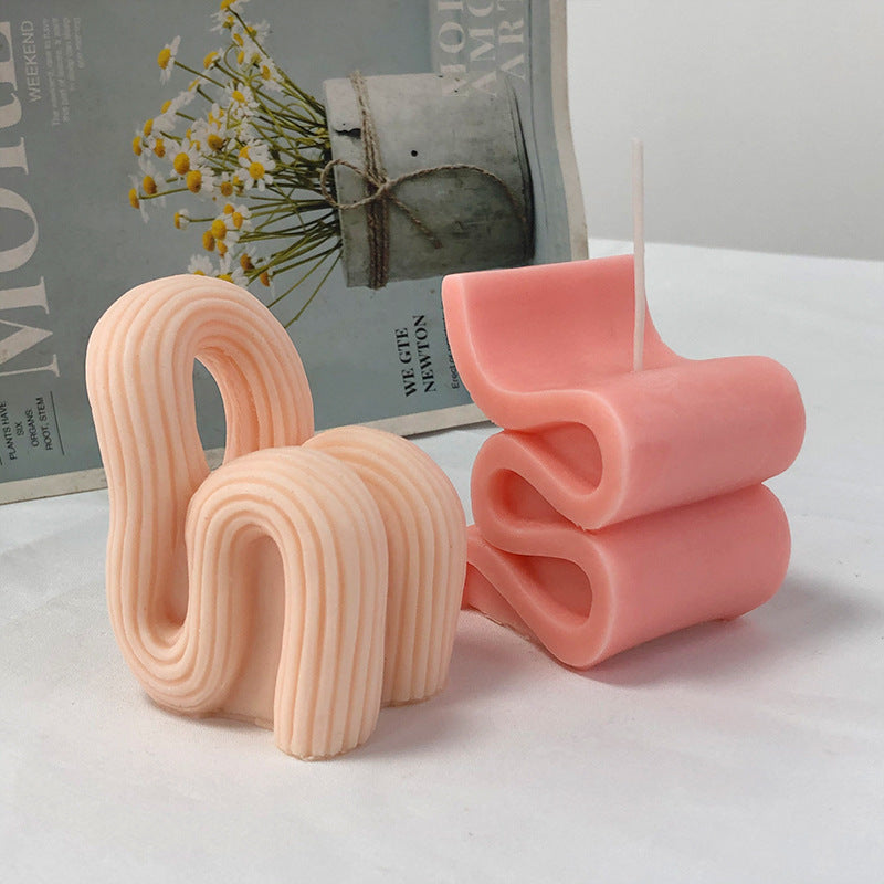 Geometric Warping Striped Sofa Chair Aromatherapy Candle Silicone Mold, Silicone candle molds, Christmas tree candle molds, Halloween pumpkin candle molds, Easter egg candle molds, Animal candle molds, Sea creature candle molds, Fruit candle molds, Geometric candle molds, Abstract candle molds, DIY candle making molds,